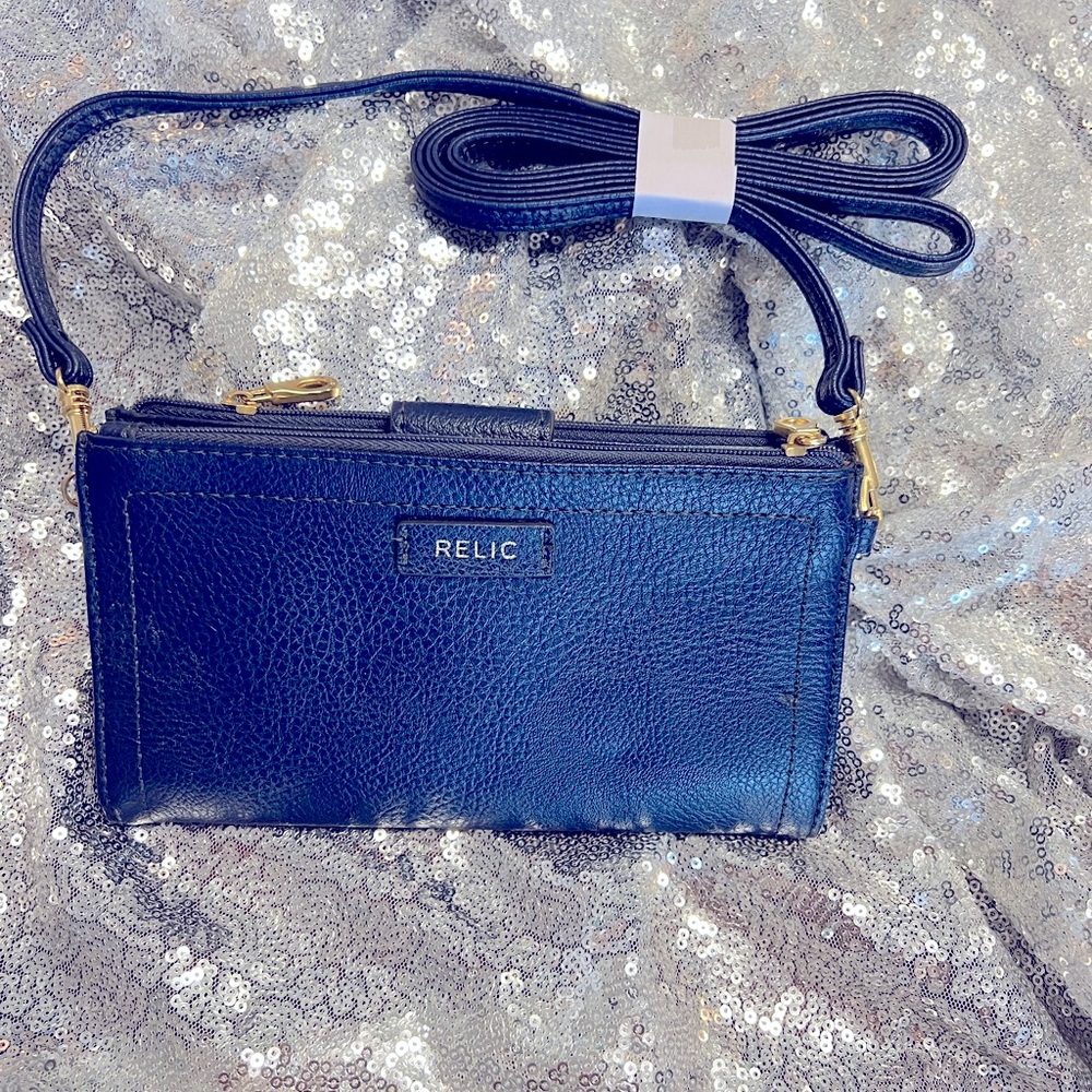 Navy Blue Relic wallet with straps . New with tags.